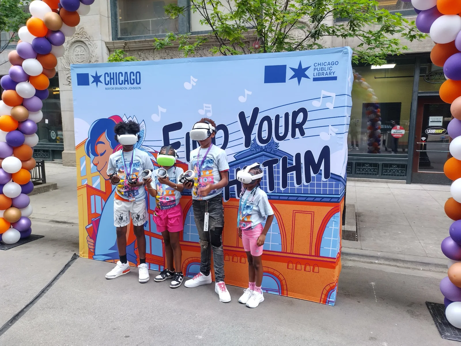 Participants wearing VR headsets at a Chicago public event