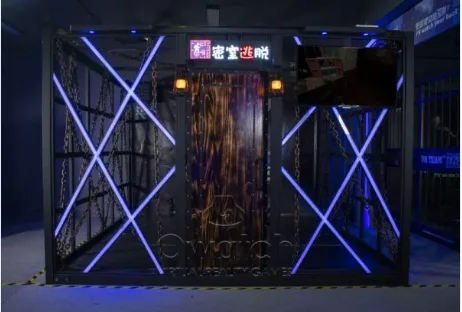 Front view of the Owatch multiplayer VR escape room enclosure with illuminated frame and entry door