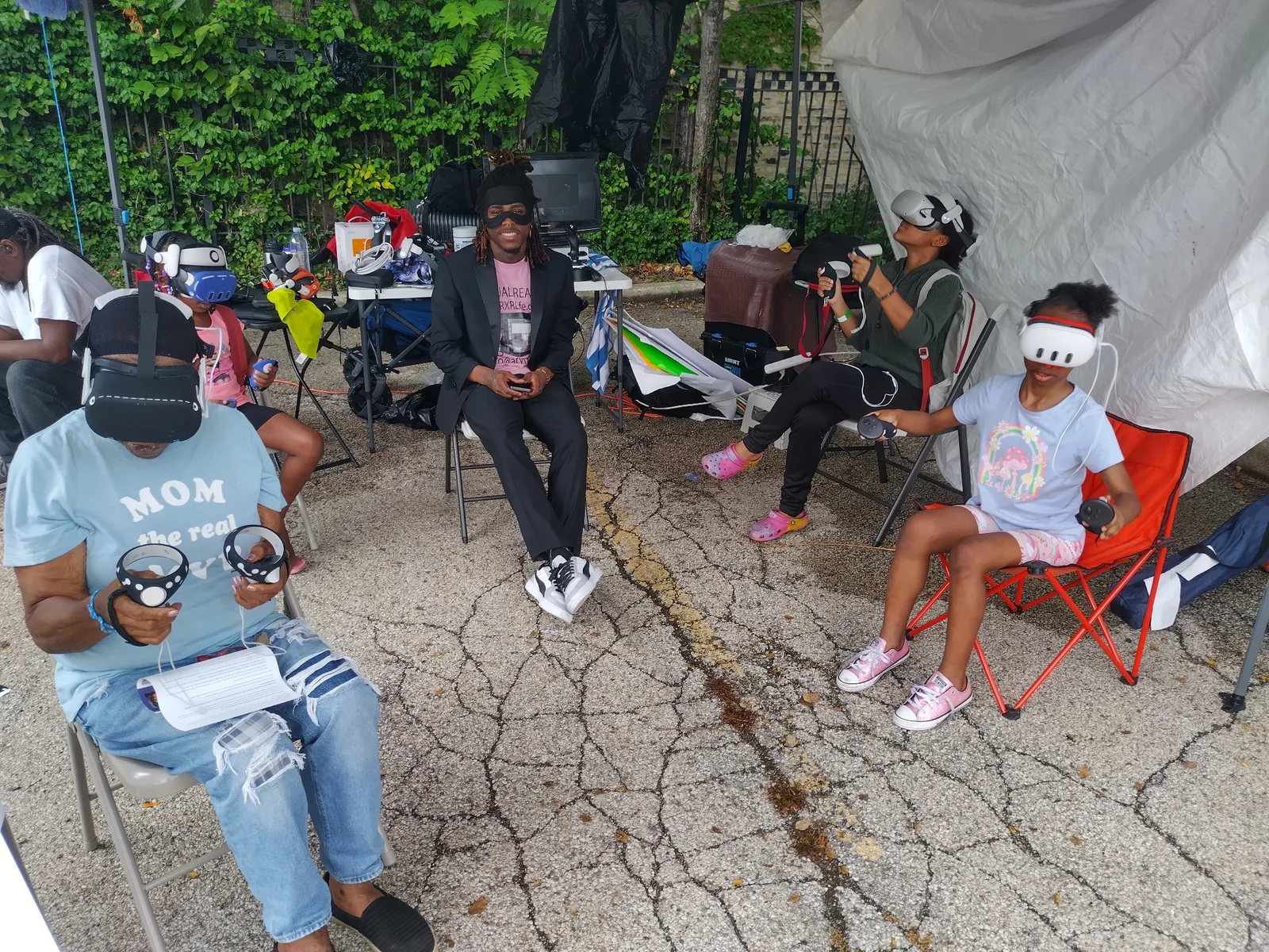 Mixed-age community members participating in virtual reality experiences