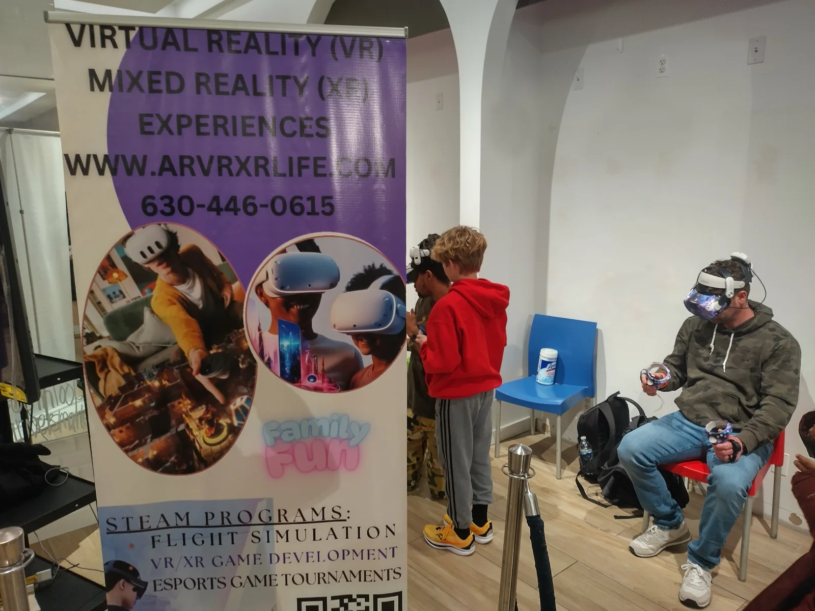 AR VR XR LIFE pop-up experience with adult and teen participants