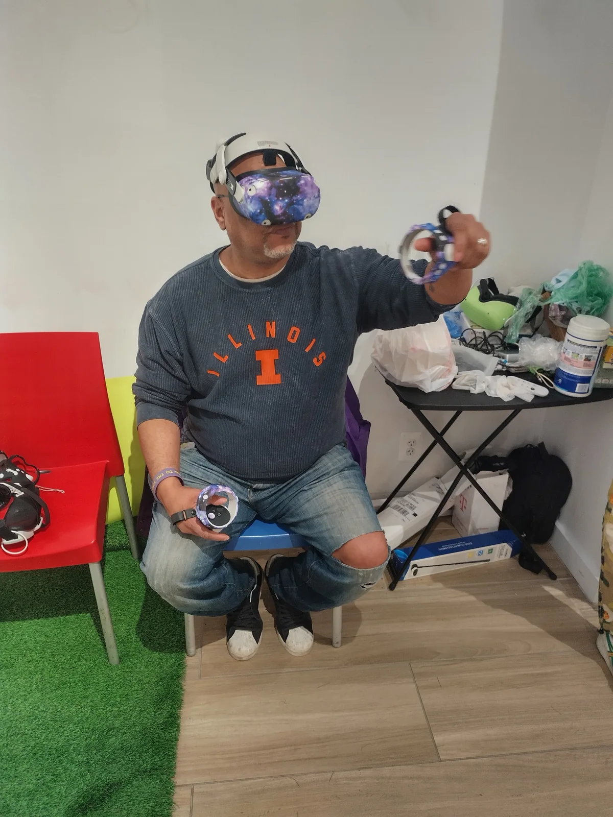 Adult participant using VR during a 2025 Chicago indoor pop-up activation
